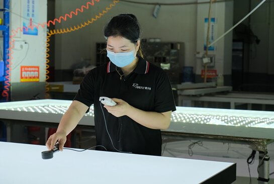 inspection in Custom Signage Factory