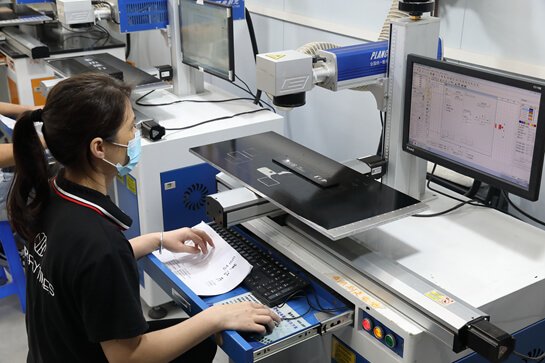 machine in Custom Signage Factory