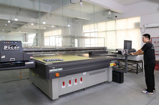 machine in Custom Signage Factory